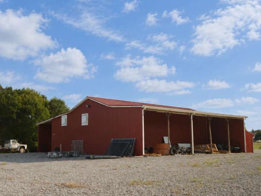 1244 Ross Wright Road, Polkton, NC 28135.  MLS# CAR4421614, YatesRealty ID 50698. Open Covered Side of Red Barn
