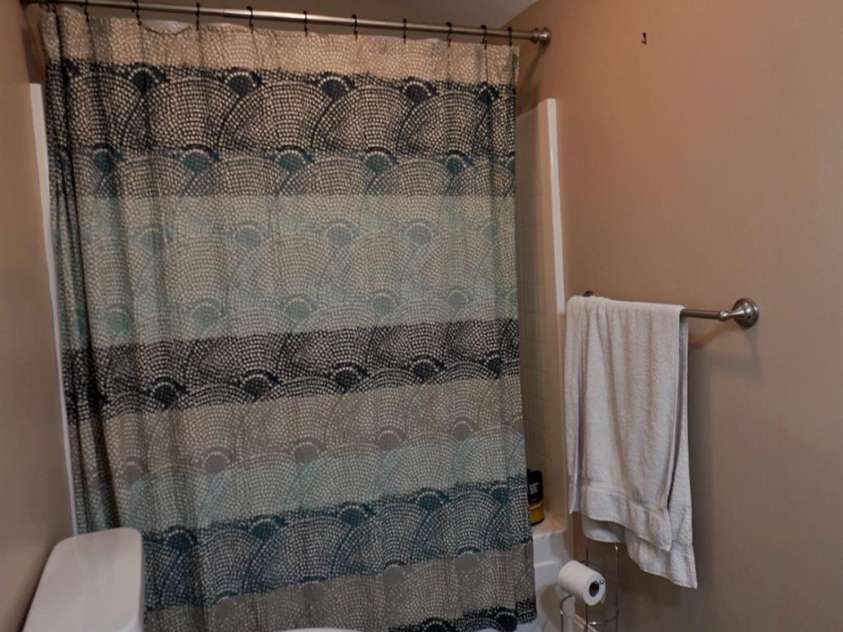 1244 Ross Wright Road, Polkton, NC 28135.  MLS# CAR4421614, YatesRealty ID 50698. Upstairs Full Bath Shower