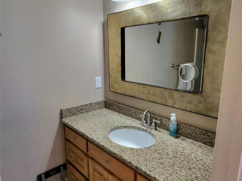 1244 Ross Wright Road, Polkton, NC 28135.  MLS# CAR4421614, YatesRealty ID 50698. Upstairs Full Bath Vanity