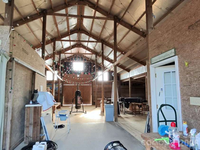 1244 Ross Wright Road, Polkton, NC 28135.  MLS# CAR4421614, YatesRealty ID 50698. White Barn Inside