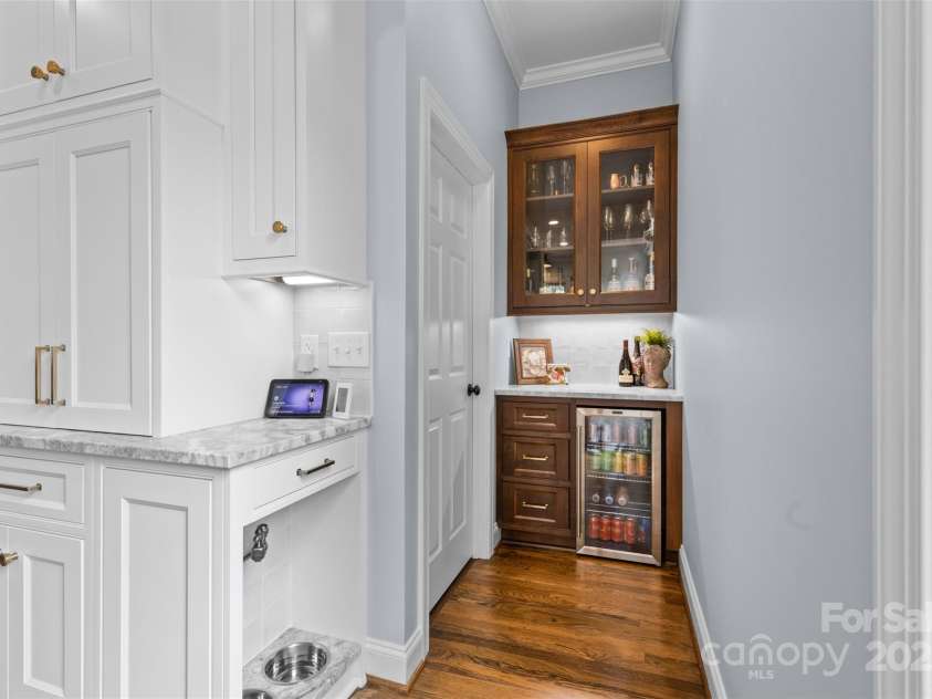 2569 Lower Assembly Drive, Fort Mill, SC 29708.  MLS# CAR4243533, YatesRealty ID 5070. Dog Watering Station & Bar w/Beverage Fridge