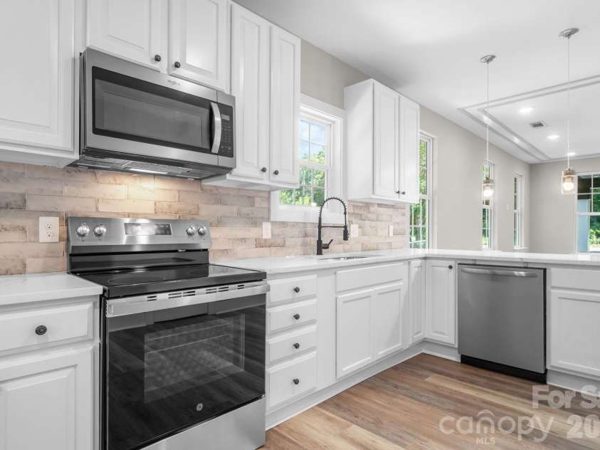 111 Clay Street, Lowell, NC 28098.  MLS# CAR4424138, YatesRealty ID 50700. 