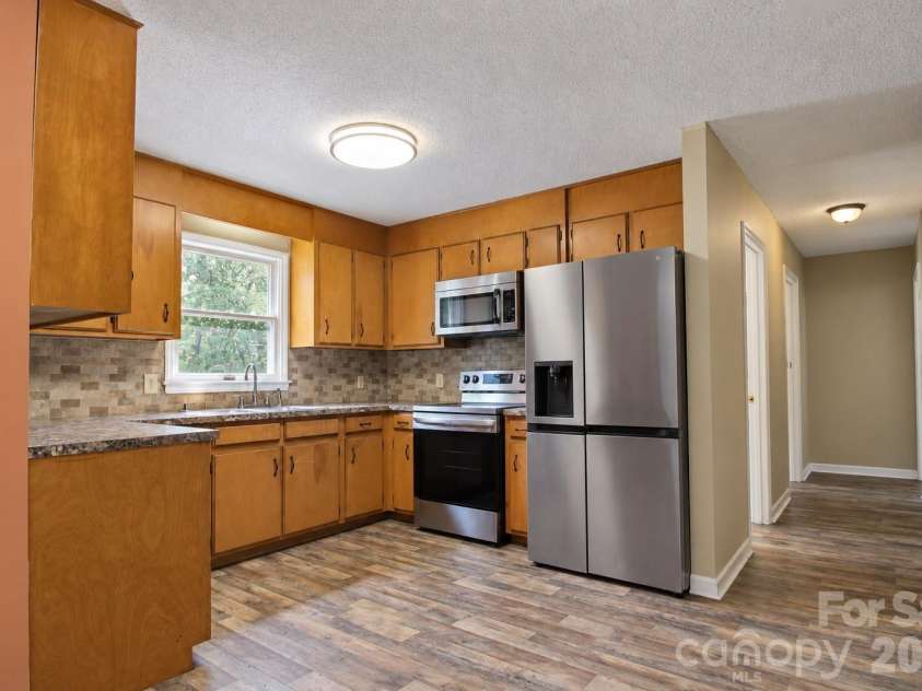 4515 Flowes Store Road, Concord, NC 28025.  MLS# CAR4424276, YatesRealty ID 50701. 