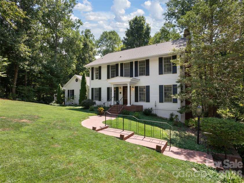 440 Sondley Woods Place, Asheville, NC 28805.  MLS# CAR4423407, YatesRealty ID 50704. Updated lighted brick sidewalk, custom wrought iron railings