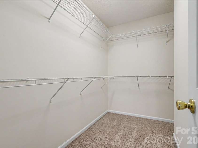 11907 Maria Ester Court, Charlotte, NC 28277.  MLS# CAR4422571, YatesRealty ID 50709. Master Closet