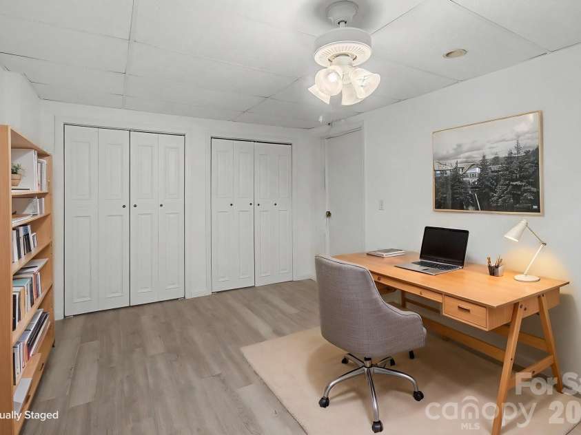 253 Tipton Hill Road, Leicester, NC 28748.  MLS# CAR4423393, YatesRealty ID 50726. Room in basement virtually staged
