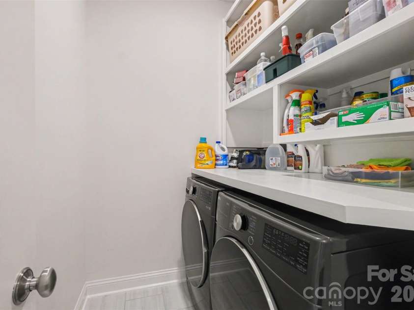 3743 Keyworth Way, Indian Land, SC 29707.  MLS# CAR4418054, YatesRealty ID 50731. The laundry room - on the same level as bedrooms - includes a folding counter and shelves for extra organization!