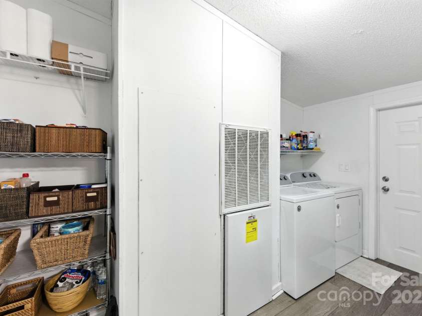 1001 Olde Creek Trail, Concord, NC 28025.  MLS# CAR4311037, YatesRealty ID 50739. Mud Room/Pantry with access to the Back Yard