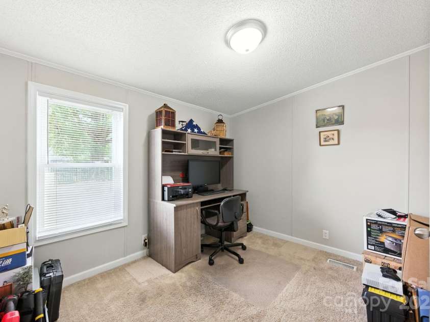 1001 Olde Creek Trail, Concord, NC 28025.  MLS# CAR4311037, YatesRealty ID 50739. Office or use as a small living room