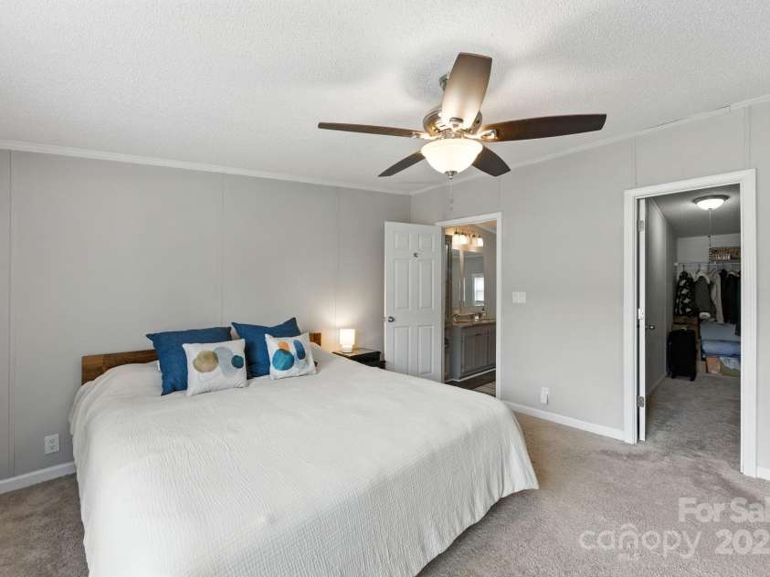 1001 Olde Creek Trail, Concord, NC 28025.  MLS# CAR4311037, YatesRealty ID 50739. Oversized Luxury Primary Bedroom