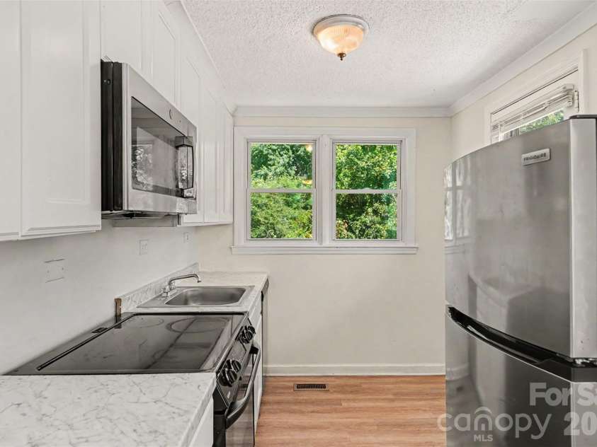 8232 Starnes Randall Road, Charlotte, NC 28215.  MLS# CAR4401795, YatesRealty ID 50741. 