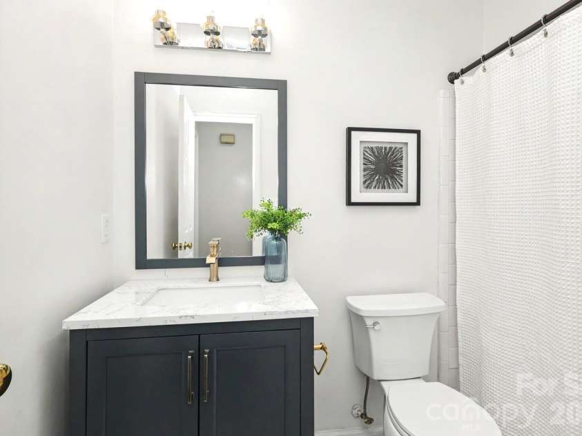5009 Sharon Road, Charlotte, NC 28210.  MLS# CAR4417626, YatesRealty ID 5075. Hall Bathroom