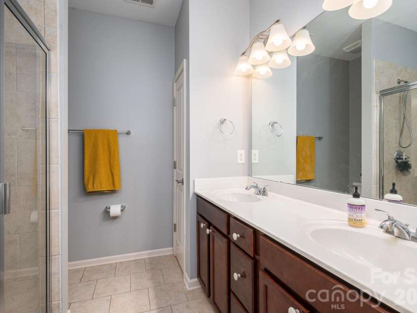 1231 Assembly Street, Belmont, NC 28012.  MLS# CAR4424275, YatesRealty ID 50753. Primary bathroom 1