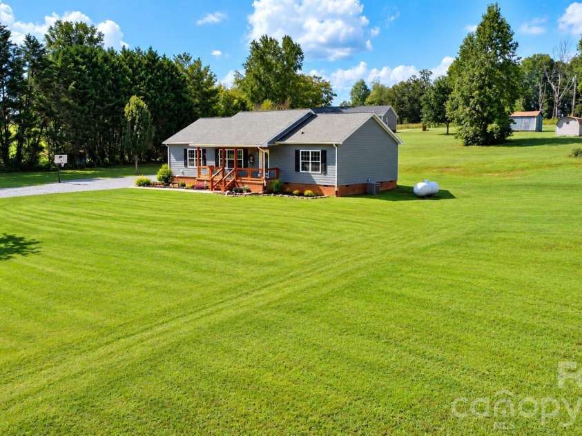 1046 Edgemont Terrace, Morganton, NC 28655.  MLS# CAR4424386, YatesRealty ID 50766. Virtually enhanced with car removal