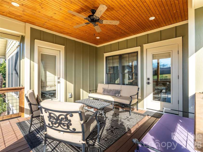 6 Starwood Valley Trail, Arden, NC 28704.  MLS# CAR4424427, YatesRealty ID 50768. Bright & inviting back porch