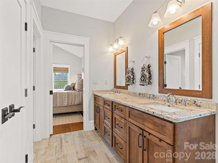 6 Starwood Valley Trail, Arden, NC 28704.  MLS# CAR4424427, YatesRealty ID 50768. Master bath with double sinks