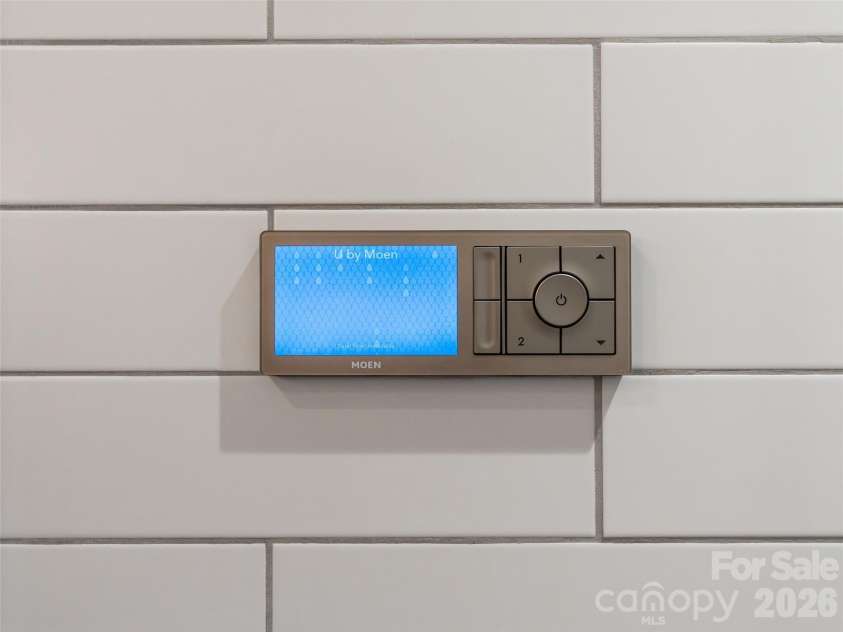 6 Starwood Valley Trail, Arden, NC 28704.  MLS# CAR4424427, YatesRealty ID 50768. Spa style shower system from U Moen