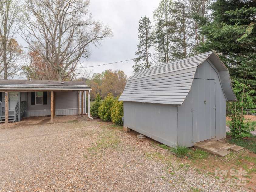 9 Scotty Circle, Candler, NC 28715.  MLS# CAR4242801, YatesRealty ID 5080. Storage Building
