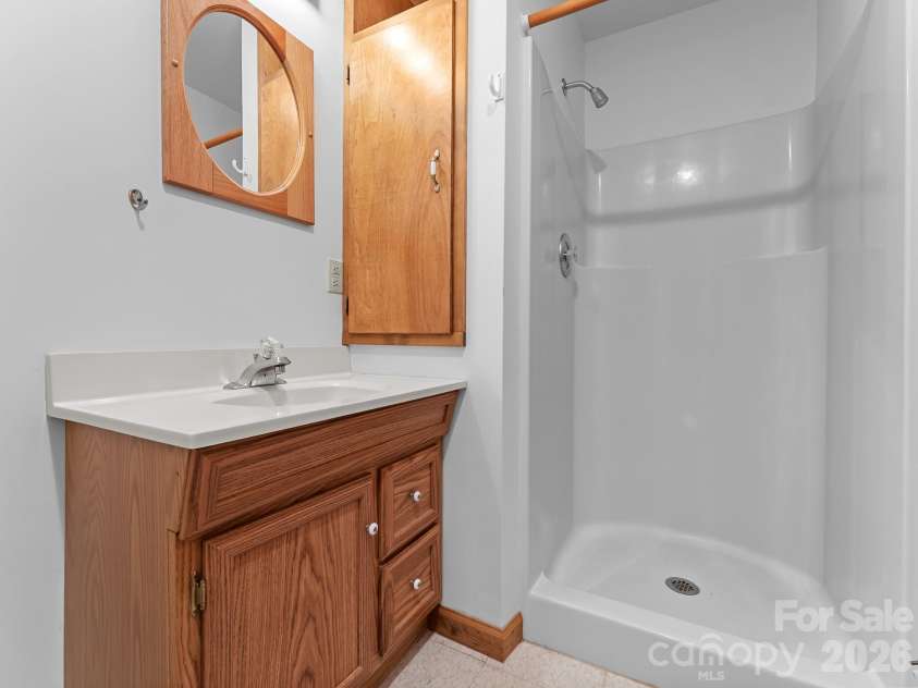 220 Wingfield Way, Brevard, NC 28712.  MLS# CAR4424278, YatesRealty ID 50800. Basement Bathroom