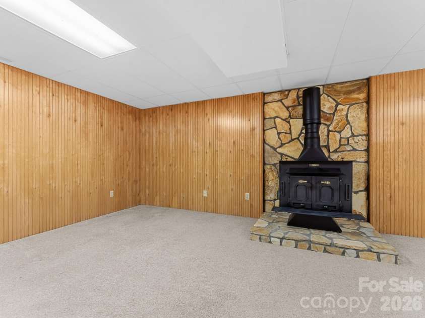 220 Wingfield Way, Brevard, NC 28712.  MLS# CAR4424278, YatesRealty ID 50800. Wood Burning Stove