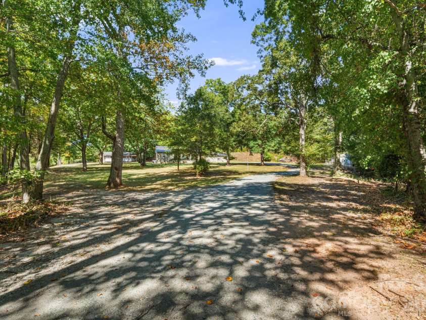 241 Ophelia Drive, Mooresboro, NC 28114.  MLS# CAR4418959, YatesRealty ID 50801. Driveway