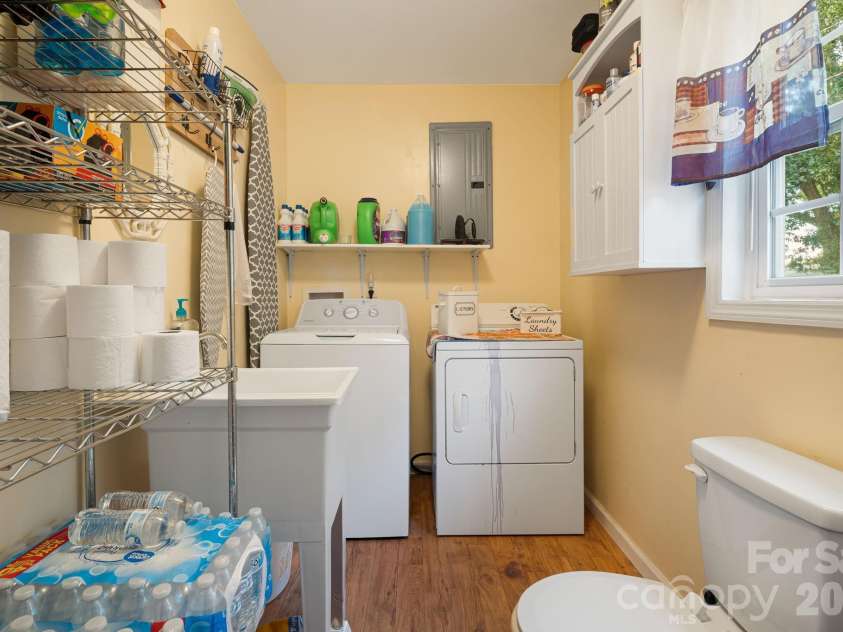 241 Ophelia Drive, Mooresboro, NC 28114.  MLS# CAR4418959, YatesRealty ID 50801. Laundry and half bath