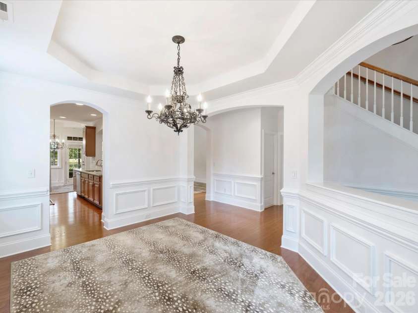 7326 Firespike Road, Charlotte, NC 28211.  MLS# CAR4417105, YatesRealty ID 50809. Dining Room leading from foyer to the kitchen.