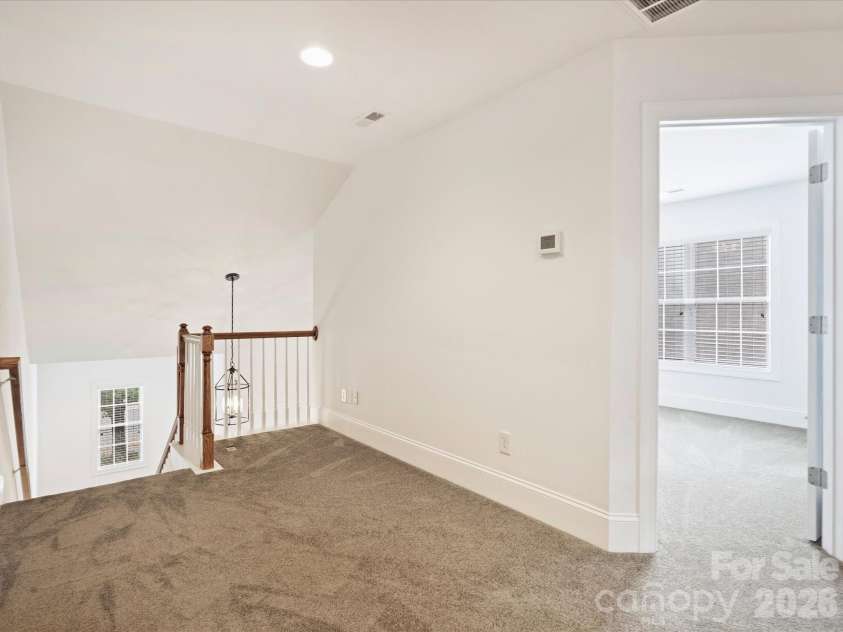 7326 Firespike Road, Charlotte, NC 28211.  MLS# CAR4417105, YatesRealty ID 50809. Second floor landing