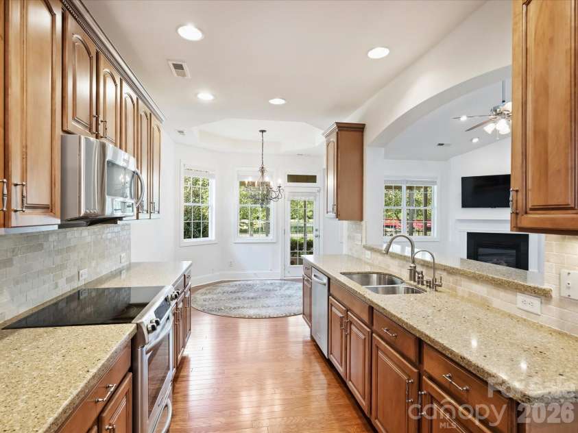 7326 Firespike Road, Charlotte, NC 28211.  MLS# CAR4417105, YatesRealty ID 50809. This kitchen features high-end KitchenAid appliances, 42-inch cabinetry, a garbage disposal, and a Moen water filtration system.