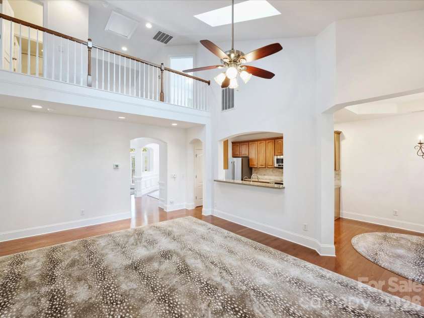 7326 Firespike Road, Charlotte, NC 28211.  MLS# CAR4417105, YatesRealty ID 50809. Vaulted ceilings with second story views from llving room