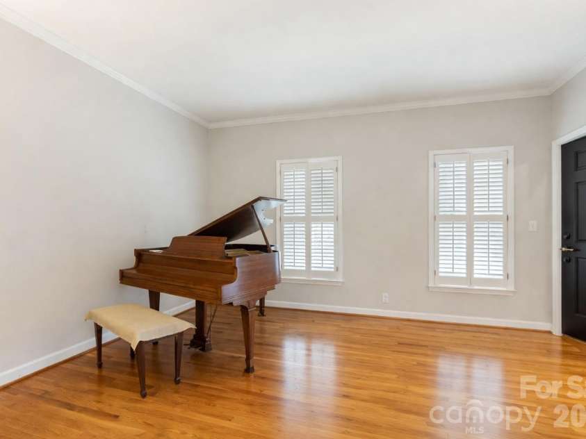 303 Bing Crosby Boulevard, Advance, NC 27006.  MLS# CAR4332638, YatesRealty ID 5081. Recently refreshed with fresh interior paint and additional improvements. Some photos have been digitally enhanced using AI to illustrate the updated spaces while new professional photography is being completed.