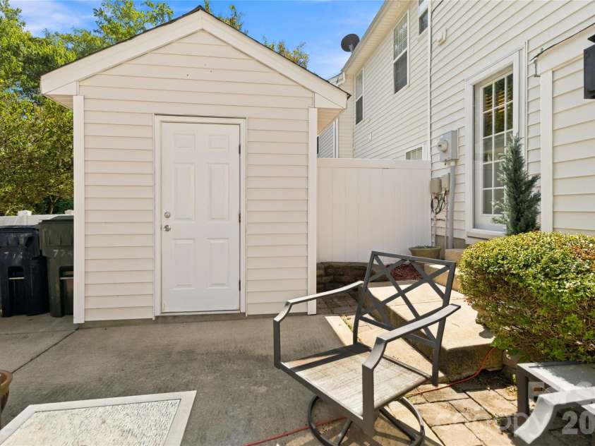 17742 Delmas Drive, Cornelius, NC 28031.  MLS# CAR4421094, YatesRealty ID 50811. Patio with Storage Shed