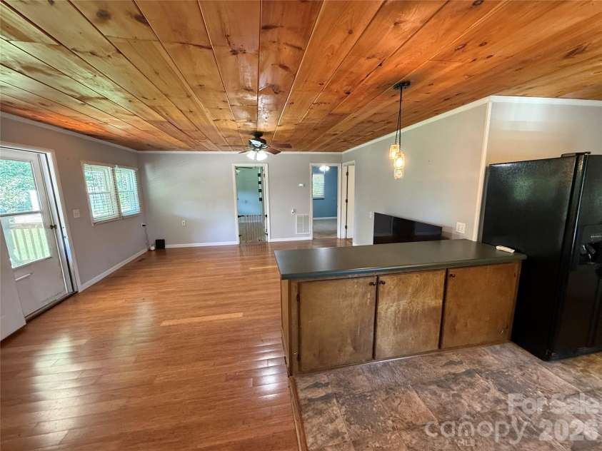 44 Oak Hill Road, Nebo, NC 28761.  MLS# CAR4423318, YatesRealty ID 50821. Dining Area looking toward Living Room