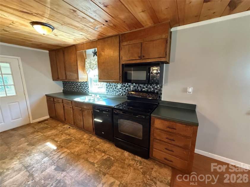 44 Oak Hill Road, Nebo, NC 28761.  MLS# CAR4423318, YatesRealty ID 50821. Kitchen area