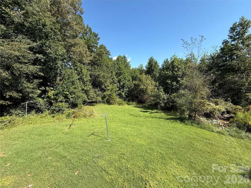 44 Oak Hill Road, Nebo, NC 28761.  MLS# CAR4423318, YatesRealty ID 50821. Overlooking Backyard