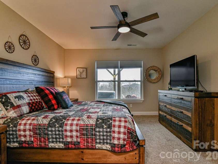 1914 Catawba Falls Parkway, Black Mountain, NC 28711.  MLS# CAR4423489, YatesRealty ID 50822. Bedroom #5 King suite on lower level