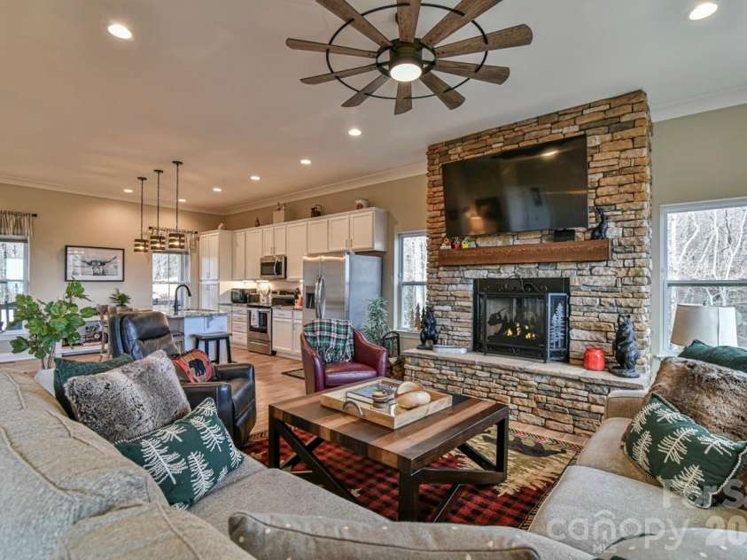 1914 Catawba Falls Parkway, Black Mountain, NC 28711.  MLS# CAR4423489, YatesRealty ID 50822. Elegant drys tacked stone fire place for those cooler mountain temps.