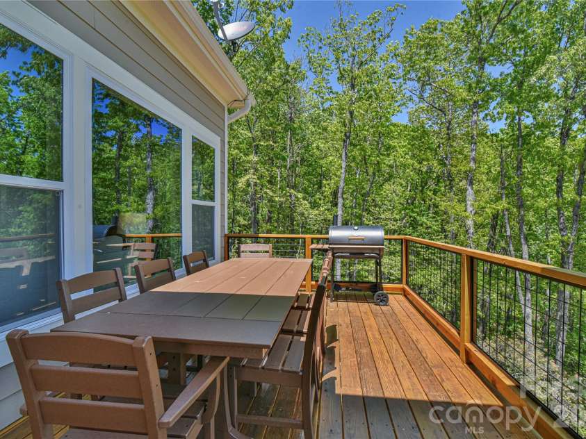 1914 Catawba Falls Parkway, Black Mountain, NC 28711.  MLS# CAR4423489, YatesRealty ID 50822. Large outdoor entertaining deck with long range mountain views.