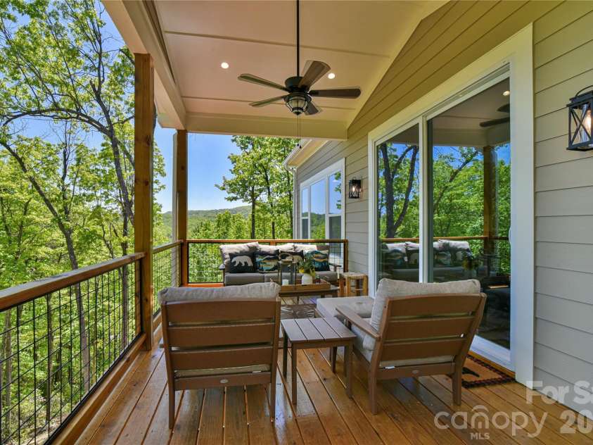 1914 Catawba Falls Parkway, Black Mountain, NC 28711.  MLS# CAR4423489, YatesRealty ID 50822. Large outdoor entertaining deck with long range mountain views.