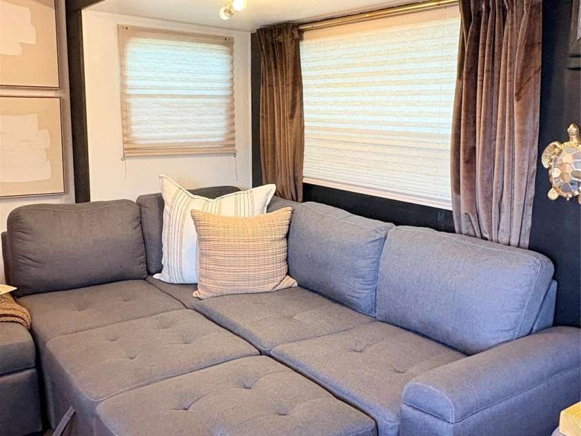 221 Grand View Drive, New London, NC 28127.  MLS# CAR4424419, YatesRealty ID 50833. Sofa converts to a queen sleeper