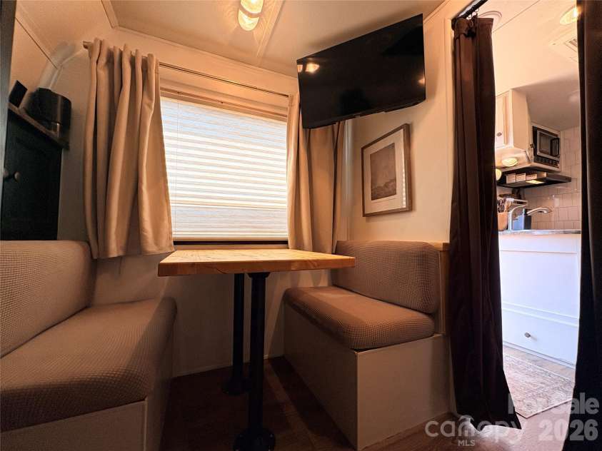 221 Grand View Drive, New London, NC 28127.  MLS# CAR4424419, YatesRealty ID 50833. Table in Bunk room could be addional dining, activity table or even an 