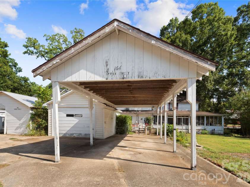 164 Spruce Street, Badin, NC 28009.  MLS# CAR4421752, YatesRealty ID 50845. 
