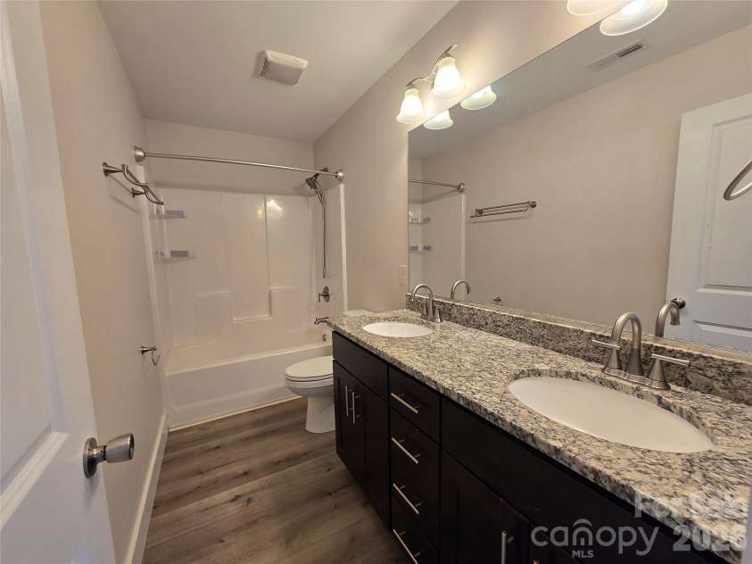 25 Wheeler Road, Weaverville, NC 28787.  MLS# CAR4424215, YatesRealty ID 50846. Granite in bathroom