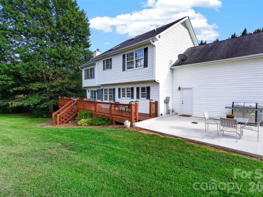 69 Sunwest Drive, Arden, NC 28704.  MLS# CAR4424300, YatesRealty ID 50854. Deck and grilling patio