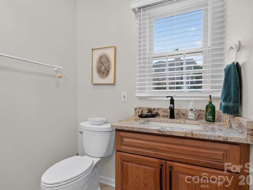 69 Sunwest Drive, Arden, NC 28704.  MLS# CAR4424300, YatesRealty ID 50854. Main Level Half-Bath