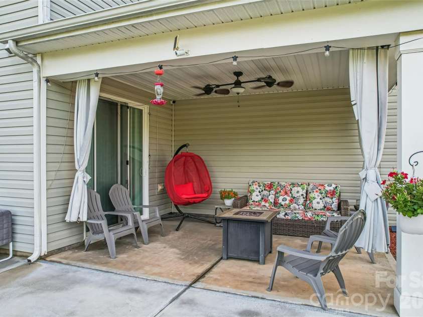 9002 Willowfield Drive, Charlotte, NC 28269.  MLS# CAR4424238, YatesRealty ID 50865. Back Covered Patio