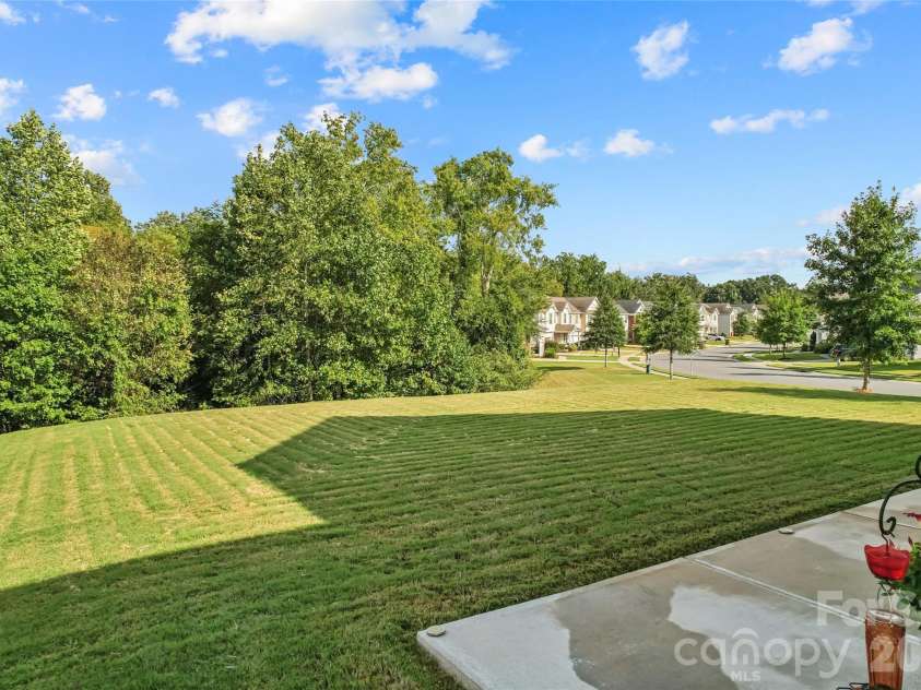 9002 Willowfield Drive, Charlotte, NC 28269.  MLS# CAR4424238, YatesRealty ID 50865. Backyard
