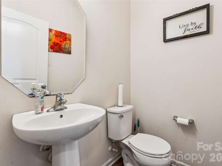 9002 Willowfield Drive, Charlotte, NC 28269.  MLS# CAR4424238, YatesRealty ID 50865. Downstairs Half Bath