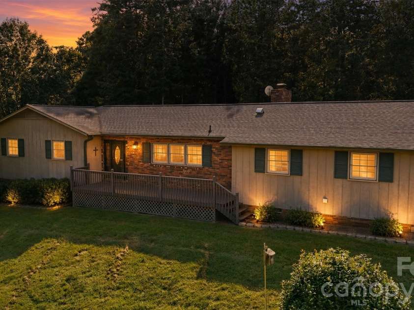 258 Nine Patch Lane, Taylorsville, NC 28681.  MLS# CAR4423574, YatesRealty ID 50868. Front Twilight enhanced