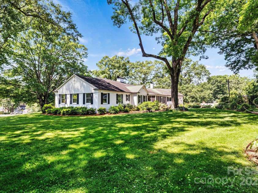 842 North Center Street, Hickory, NC 28601.  MLS# CAR4215232, YatesRealty ID 5087. Backyard/Side View